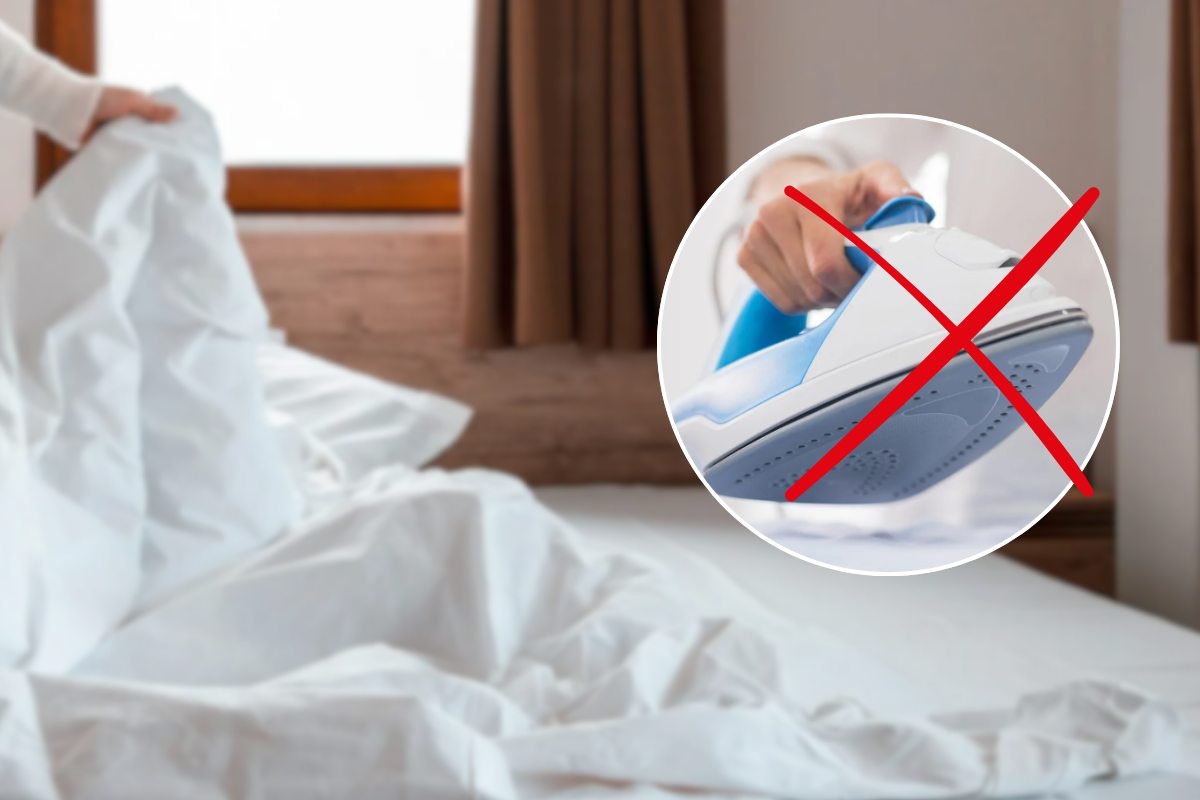 Lenzuola sul letto e ferro da stiro