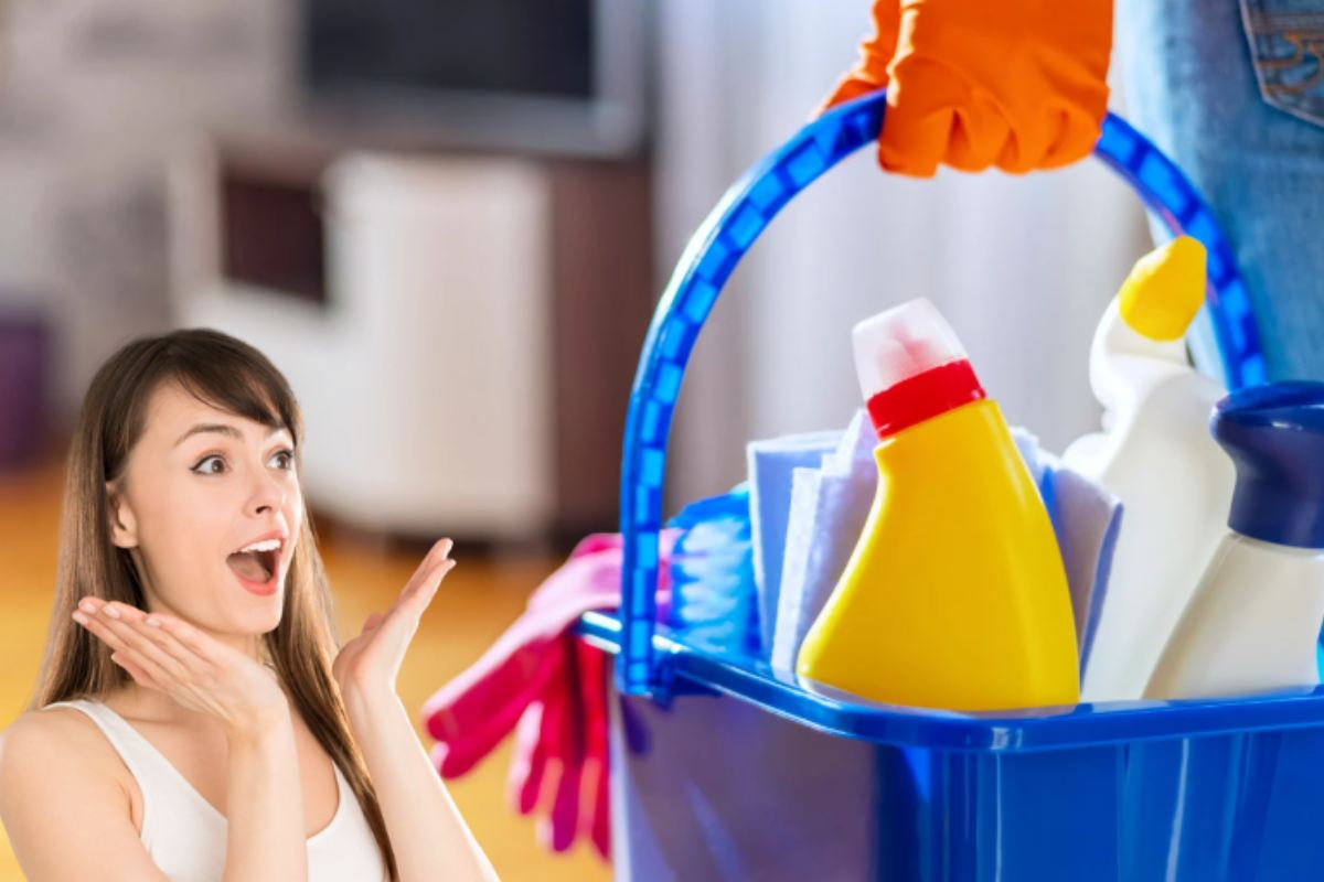 Prodotti per le pulizie di casa e donna sorpresa