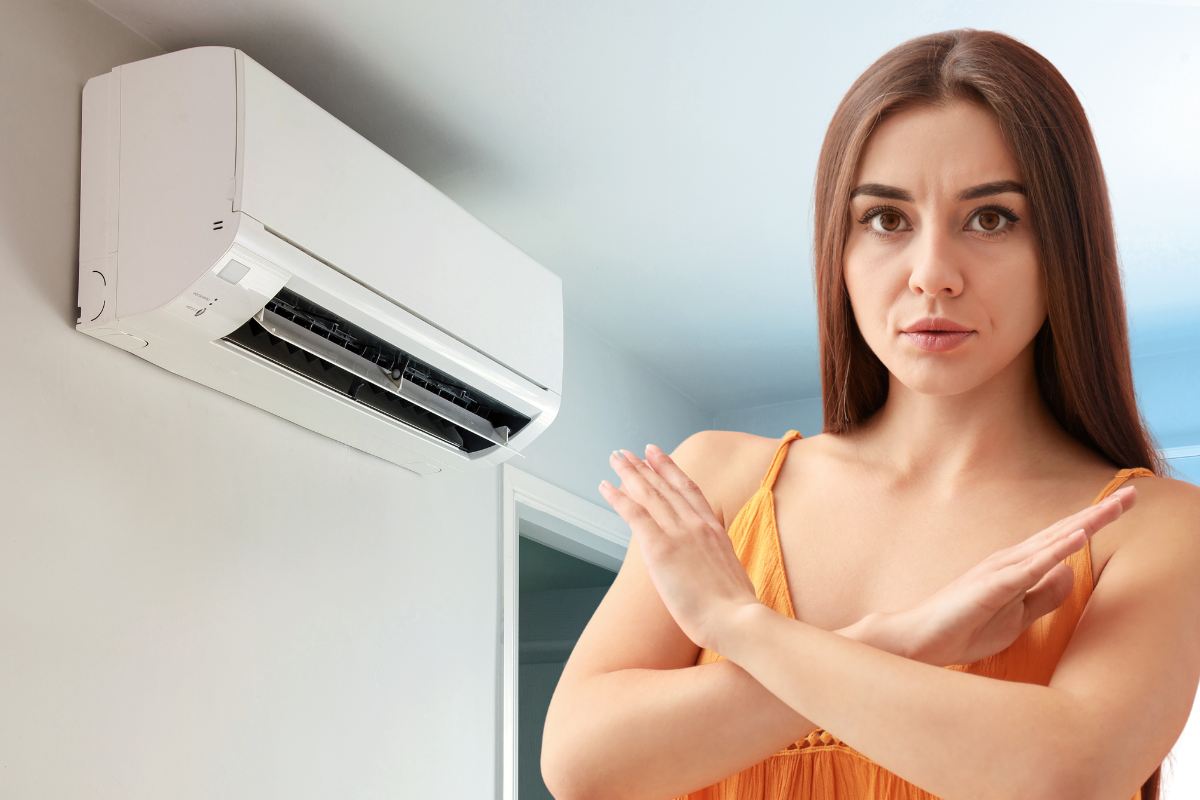 condizionatore donna braccia a croce