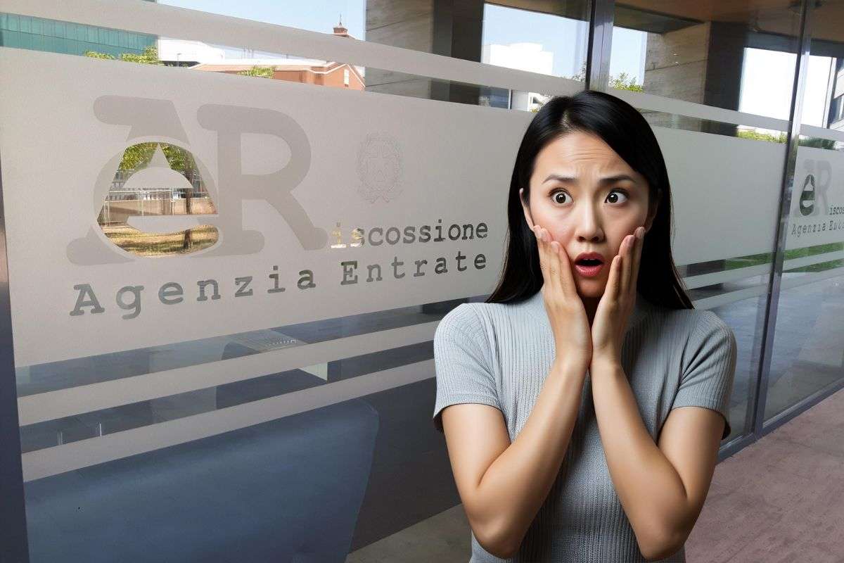 vetrata dell'agenzia delle entrate e donna spaventata